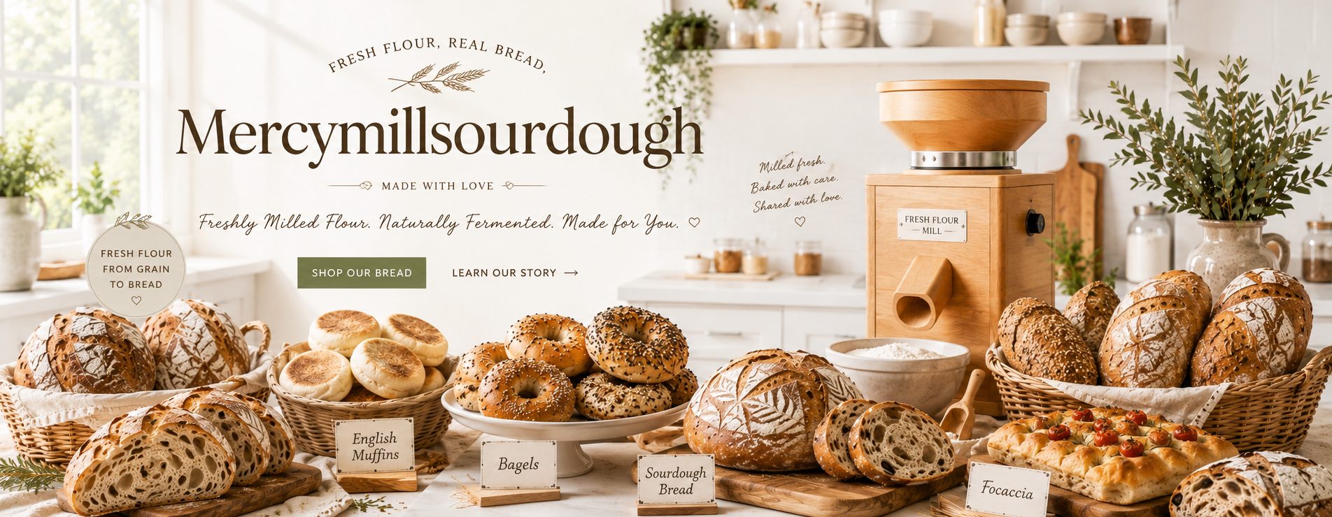 Mercy Mill Sourdough — freshly milled flour and naturally fermented bread, with loaves, bagels, English muffins and focaccia laid out in a bright kitchen